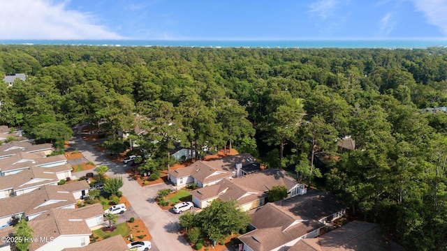 111 Mcginnis Dr, Pine Knoll Shores, NC 28512 - aerial perspective of suburban area featuring a heavily wooded area