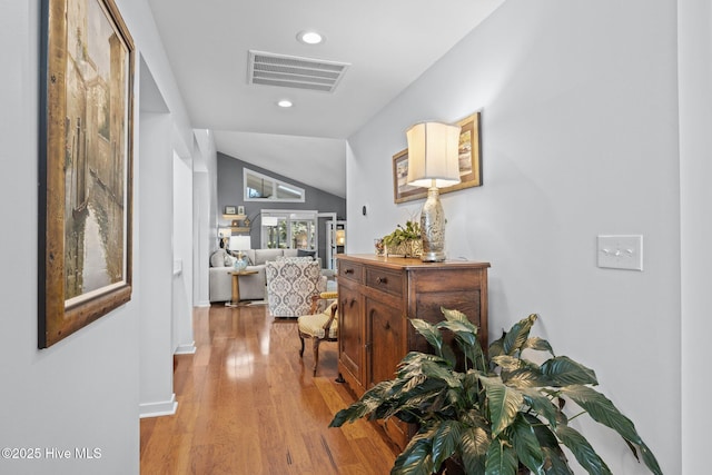 111 Mcginnis Dr, Pine Knoll Shores, NC 28512 - corridor with recessed lighting, light wood-style floors, and vaulted ceiling