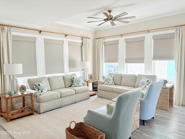 23 Leland St, Ocean Isle Beach, NC 28469 - living area featuring crown molding, a ceiling fan, and wood finished floors
