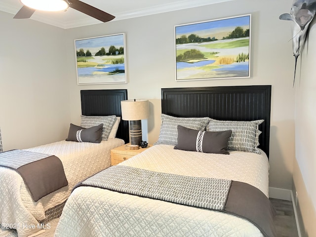 23 Leland St, Ocean Isle Beach, NC 28469 - bedroom featuring ornamental molding, wood finished floors, and a ceiling fan