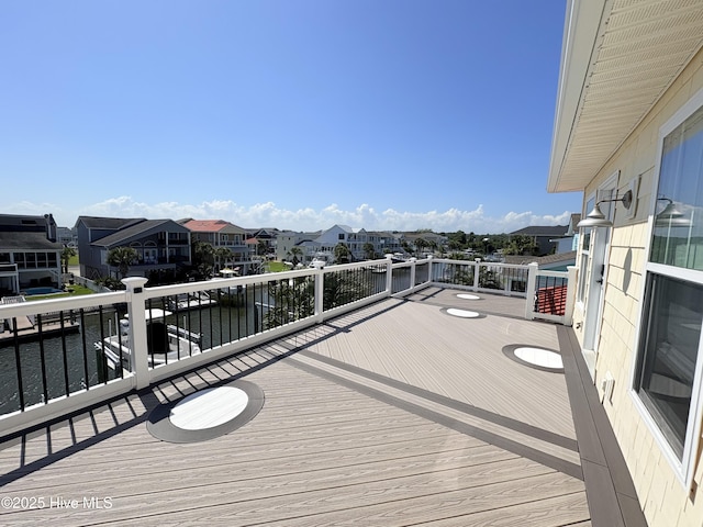 23 Leland St, Ocean Isle Beach, NC 28469 - deck featuring a residential view