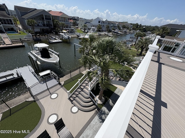 23 Leland St, Ocean Isle Beach, NC 28469 - balcony featuring a water view, a residential view, boat lift, and a dock
