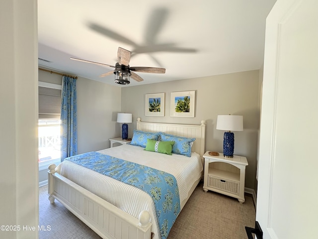 23 Leland St, Ocean Isle Beach, NC 28469 - bedroom featuring baseboards and ceiling fan