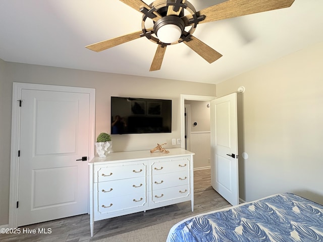 23 Leland St, Ocean Isle Beach, NC 28469 - bedroom with wood finished floors and a ceiling fan