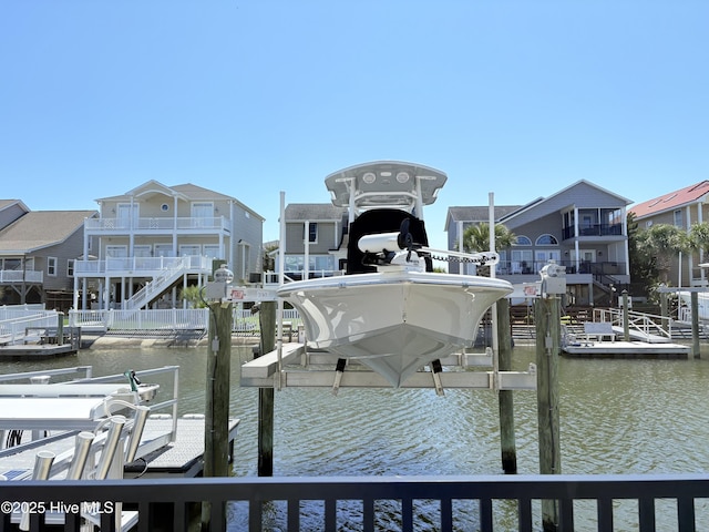 23 Leland St, Ocean Isle Beach, NC 28469 - dock with boat lift and a water view
