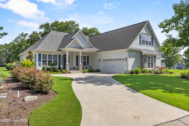 3478 Belle Meade Way NE, Leland, NC 28451 - craftsman-style home featuring covered porch, a garage, driveway, a front lawn, and roof with shingles