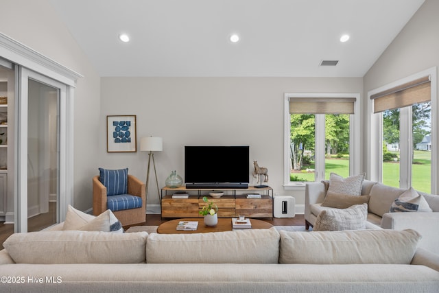 3478 Belle Meade Way NE, Leland, NC 28451 - living room featuring vaulted ceiling, wood finished floors, and recessed lighting