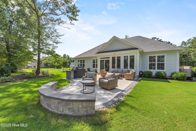 3478 Belle Meade Way NE, Leland, NC 28451 - rear view of house with a patio area, outdoor lounge area, a lawn, and a shingled roof