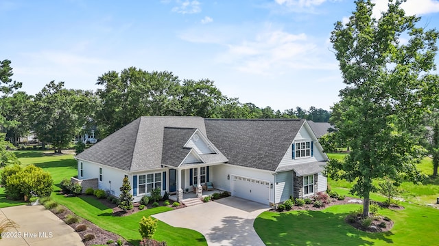 3478 Belle Meade Way NE, Leland, NC 28451 - view of front of house with concrete driveway, a garage, a front yard, and a shingled roof