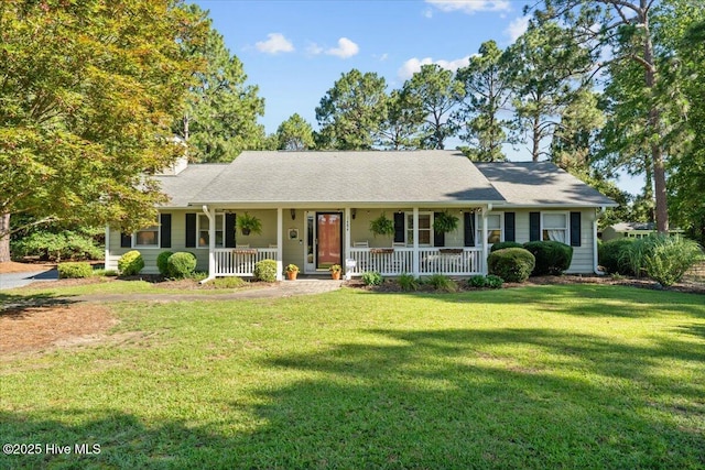 1484 Rays Bridge Rd, Whispering Pines, NC 28327 - ranch-style house with covered porch and a front yard