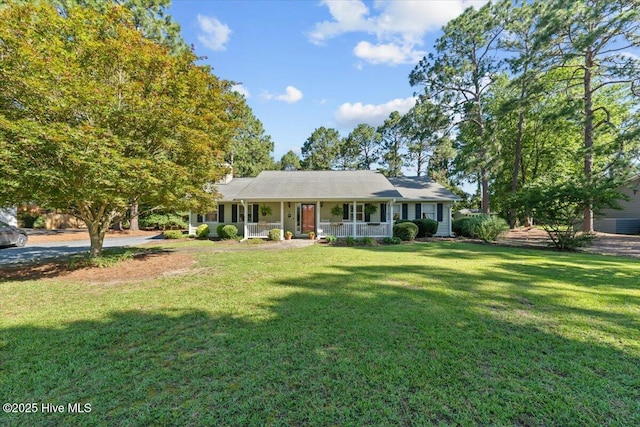 1484 Rays Bridge Rd, Whispering Pines, NC 28327 - single story home with covered porch and a front yard
