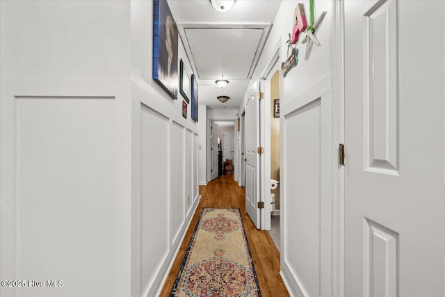 1484 Rays Bridge Rd, Whispering Pines, NC 28327 - hall featuring light wood finished floors and attic access