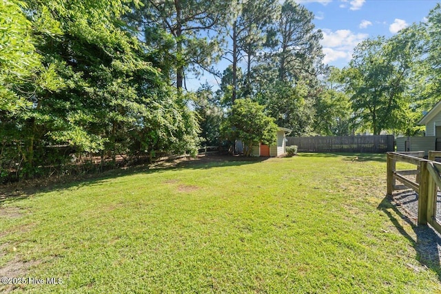 1484 Rays Bridge Rd, Whispering Pines, NC 28327 - fenced backyard with a shed