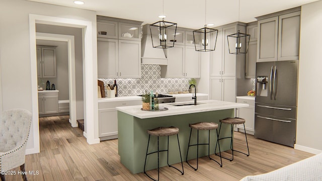 108 Firefly Dr, Wallace, NC 28466 - kitchen with stainless steel refrigerator with ice dispenser, custom exhaust hood, backsplash, light countertops, and recessed lighting