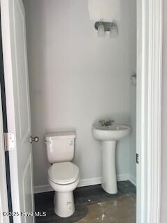 806 Palm Frond Way Unit 44, Calabash, NC 28467 - bathroom with toilet and baseboards