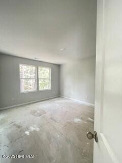 806 Palm Frond Way Unit 44, Calabash, NC 28467 - spare room featuring baseboards
