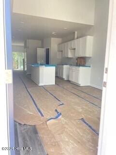 806 Palm Frond Way Unit 44, Calabash, NC 28467 - kitchen with white cabinets