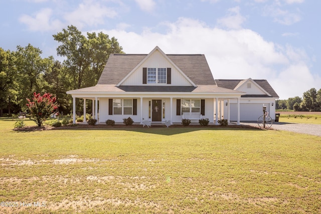 337 Brewington Rd, Clinton, NC 28328 - country-style home with covered porch, gravel driveway, a front lawn, a shingled roof, and an attached garage
