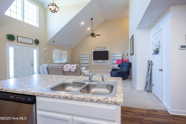 337 Brewington Rd, Clinton, NC 28328 - kitchen featuring stainless steel dishwasher, open floor plan, white cabinetry, light countertops, and dark wood-type flooring