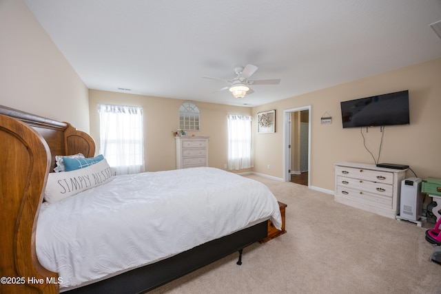 337 Brewington Rd, Clinton, NC 28328 - bedroom featuring multiple windows, carpet, and ceiling fan