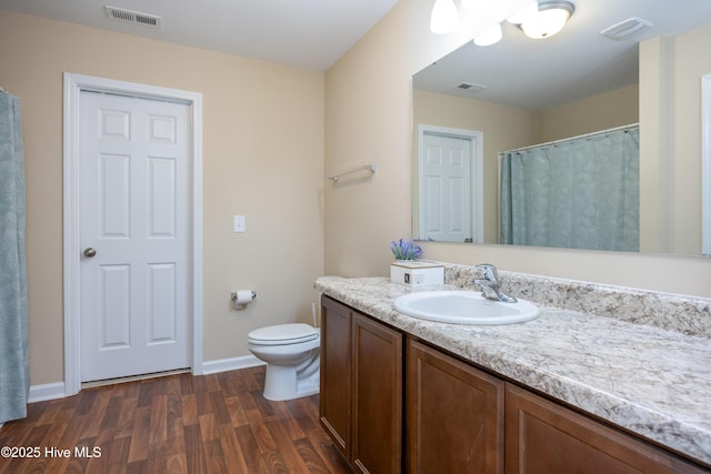 337 Brewington Rd, Clinton, NC 28328 - full bath with vanity and wood finished floors