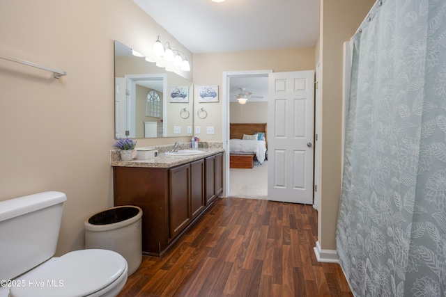 337 Brewington Rd, Clinton, NC 28328 - ensuite bathroom with wood finished floors, vanity, a ceiling fan, and a shower with curtain