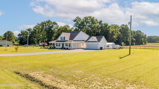 337 Brewington Rd, Clinton, NC 28328 - view of front facade with driveway, a garage, a front yard, and covered porch