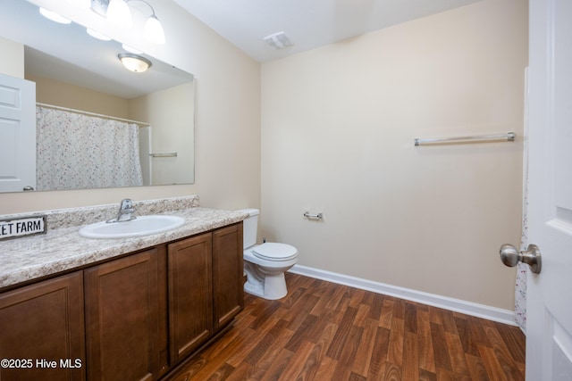 337 Brewington Rd, Clinton, NC 28328 - full bathroom with vanity and wood finished floors