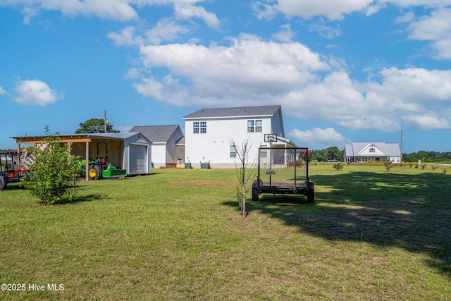 337 Brewington Rd, Clinton, NC 28328 - rear view of house featuring a lawn