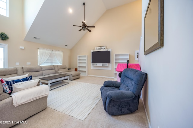 337 Brewington Rd, Clinton, NC 28328 - carpeted living area with high vaulted ceiling, ceiling fan, and built in shelves