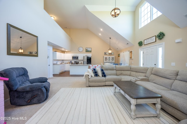 337 Brewington Rd, Clinton, NC 28328 - living room featuring high vaulted ceiling and light carpet