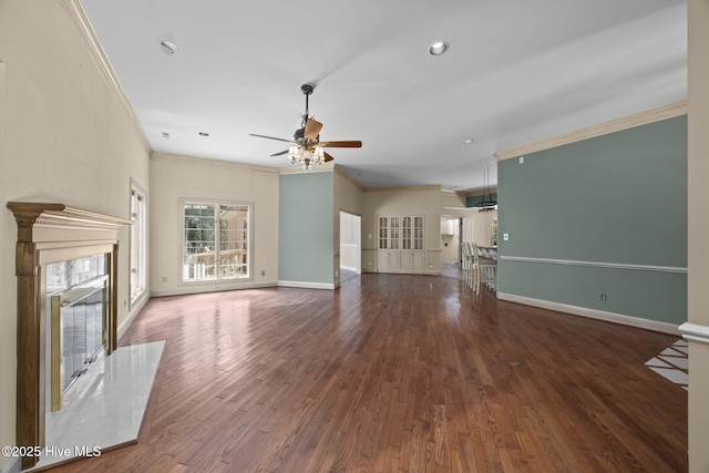 7006 Club House Dr, New Bern, NC 28562 - unfurnished living room with crown molding, ceiling fan, wood finished floors, a high end fireplace, and recessed lighting