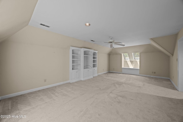 7006 Club House Dr, New Bern, NC 28562 - bonus room with lofted ceiling, a ceiling fan, and light carpet