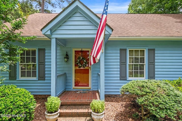 5025 Netherwood Rd, Rocky Mount, NC 27803 - doorway to property featuring a shingled roof