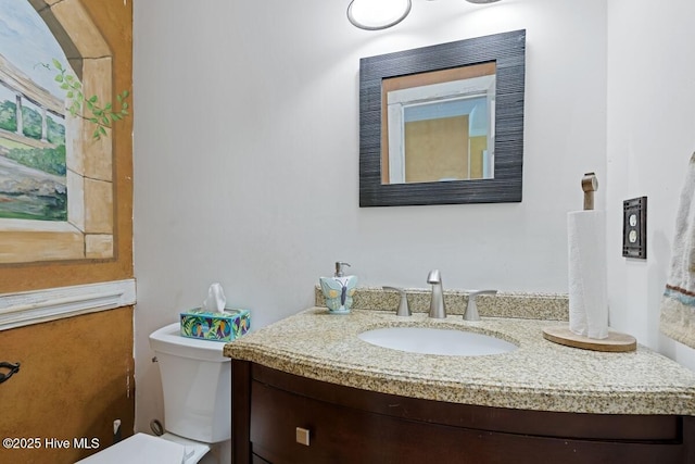 5025 Netherwood Rd, Rocky Mount, NC 27803 - half bathroom featuring vanity and toilet