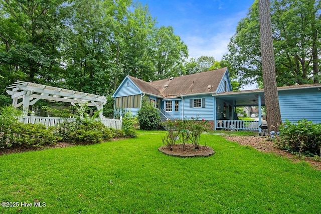 5025 Netherwood Rd, Rocky Mount, NC 27803 - rear view of house featuring a pergola and a sunroom