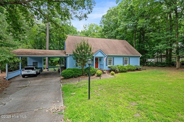 5025 Netherwood Rd, Rocky Mount, NC 27803 - view of front of property with concrete driveway, a front lawn, and an attached carport