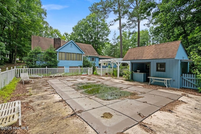 5025 Netherwood Rd, Rocky Mount, NC 27803 - view of patio / terrace with an outbuilding