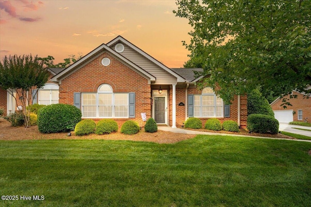4465 Orchard Knob Ln, High Point, NC 27265 - view of front of property with brick siding and a front lawn