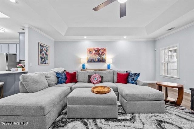 4465 Orchard Knob Ln, High Point, NC 27265 - living area featuring a tray ceiling, wood finished floors, ornamental molding, a ceiling fan, and recessed lighting