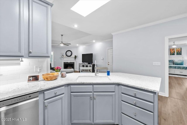 4465 Orchard Knob Ln, High Point, NC 27265 - kitchen featuring stainless steel dishwasher, gray cabinets, a ceiling fan, crown molding, and open floor plan
