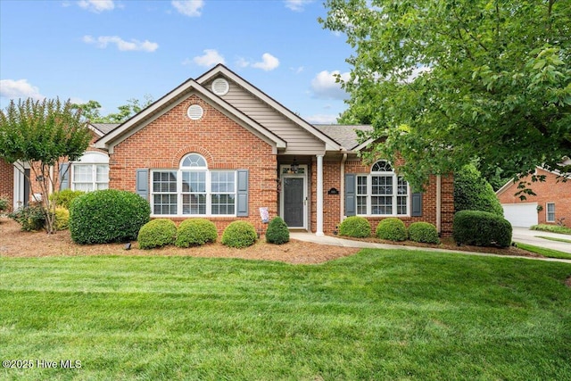 4465 Orchard Knob Ln, High Point, NC 27265 - view of front of property featuring a front lawn and brick siding