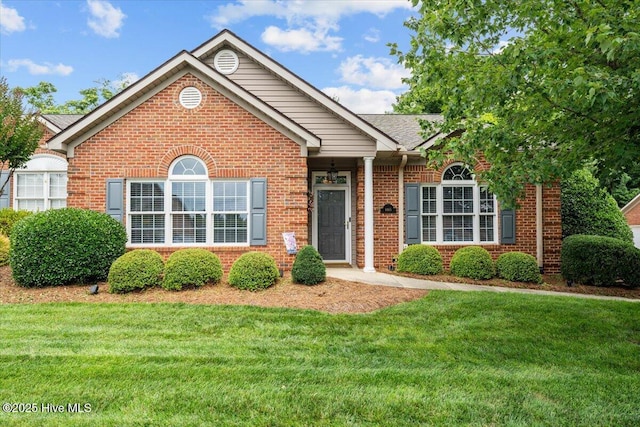 4465 Orchard Knob Ln, High Point, NC 27265 - view of front facade with a front lawn and brick siding