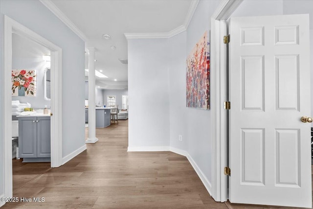 4465 Orchard Knob Ln, High Point, NC 27265 - corridor with crown molding, wood finished floors, and ornate columns