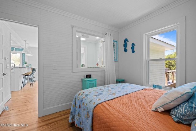 210 Upchurch Dr, Newport, NC 28570 - bedroom with crown molding and wood finished floors