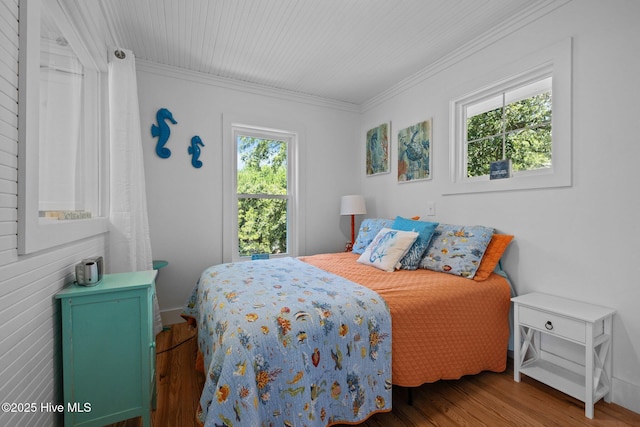 210 Upchurch Dr, Newport, NC 28570 - bedroom with crown molding and wood finished floors