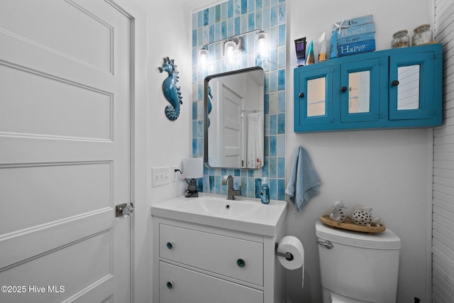 210 Upchurch Dr, Newport, NC 28570 - bathroom featuring vanity and tasteful backsplash