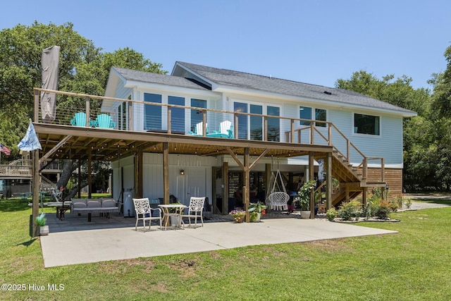 210 Upchurch Dr, Newport, NC 28570 - back of property with stairs, a patio area, a deck, and a yard
