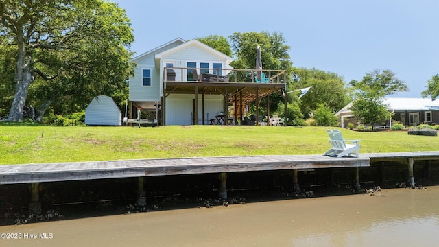 210 Upchurch Dr, Newport, NC 28570 - rear view of property featuring a wooden deck, a lawn, and stairs