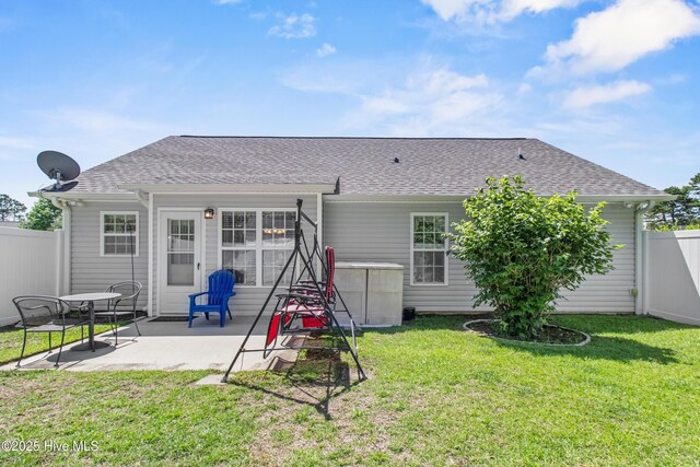 4399 Owendon Dr, Shallotte, NC 28470 - back of house with a patio area and roof with shingles